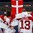 BUFFALO, NEW YORK - JANUARY 4: Denmark's Phillip Schultz #27 and Christian Mathiasen-Wejse #13 stand arm-in-arm during the national anthem following their team's victory over Belarus during the relegation round of the 2018 IIHF World Junior Championship. (Photo by Andrea Cardin/HHOF-IIHF Images)

